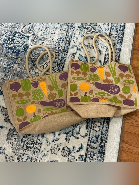 Trader Joe'S Handbags - Bundle of 2Trader Joe's jute tote bag features a colorful vegetable pattern